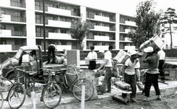 Residents begin moving into the Takanedai Housing Complex (photographed in 1961)